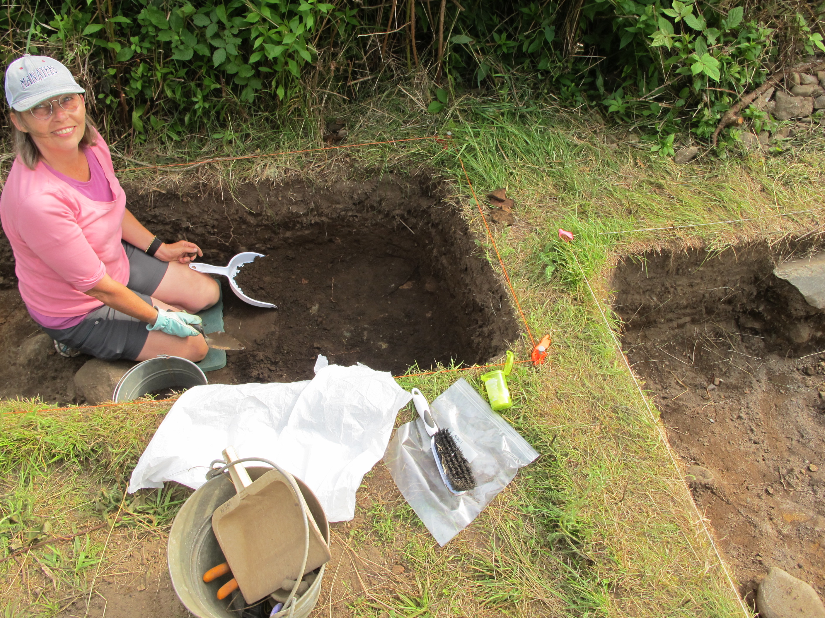 Tanya is working in the midden today . We are starting to get quite deep now and the artifact density is picking up.