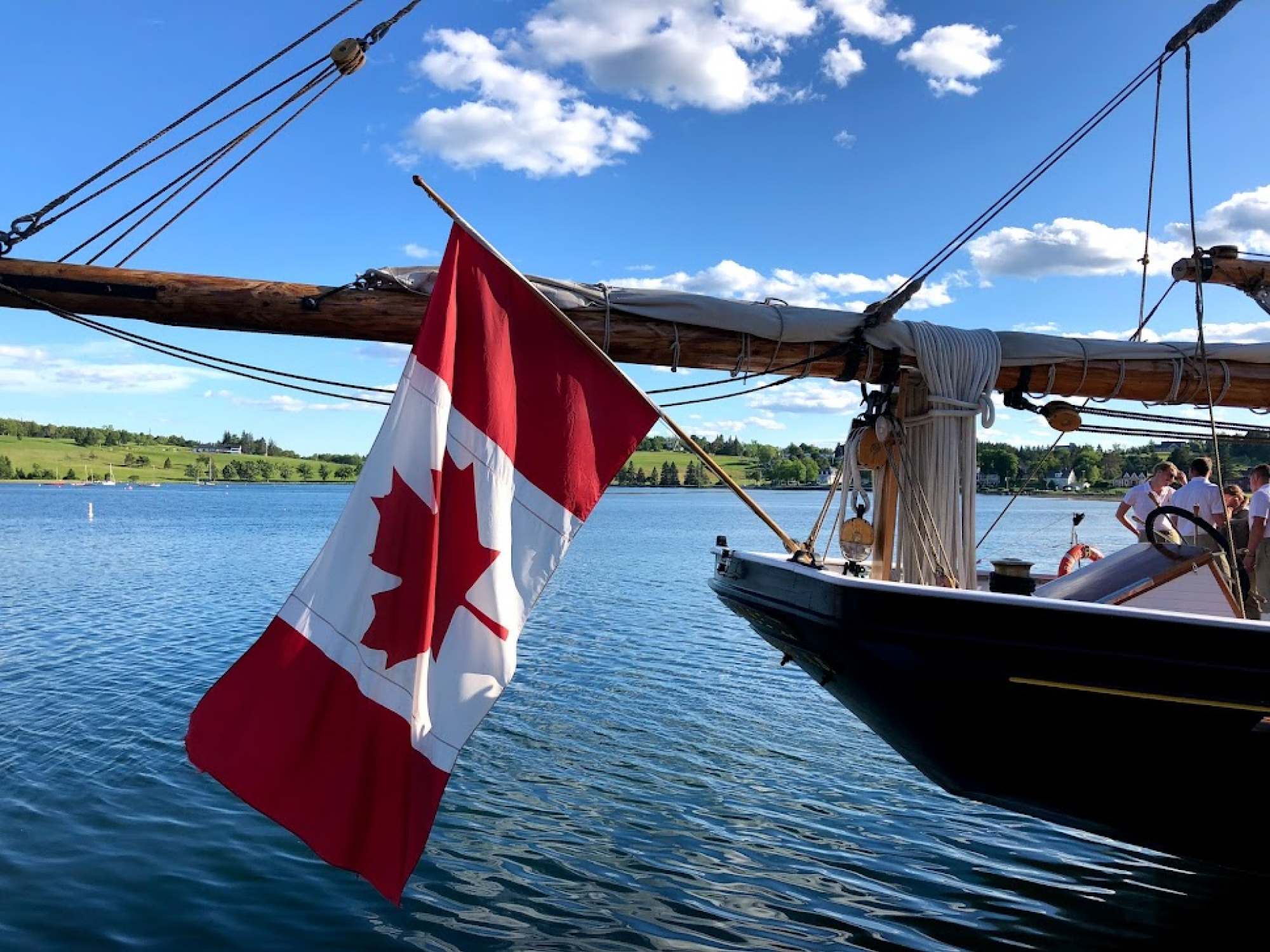 Canadian flag hanging off the stern of the Bluenose II.