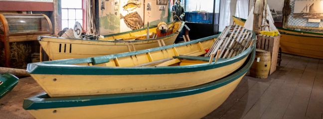 Two yellow dory boats