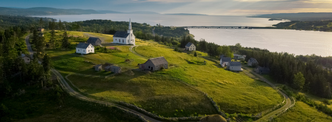 Areal view of a church on a green field