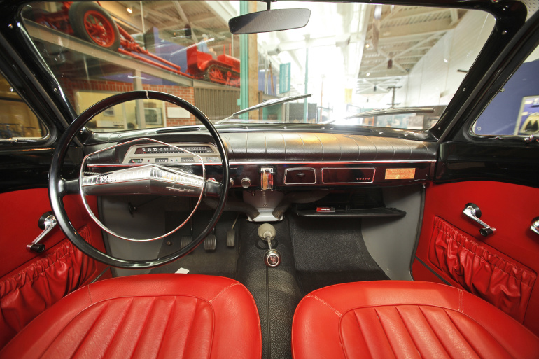Volvo Canadian, red leather interior, view through the windshield. 