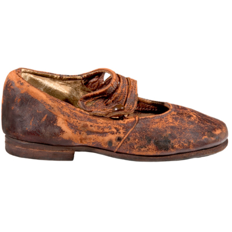 Side view of a leather children’s shoe is believed to be from Body No. 4, the “Unknown Child”