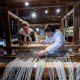 Fisheries Museum of the Atlantic interpreters working on a loom.