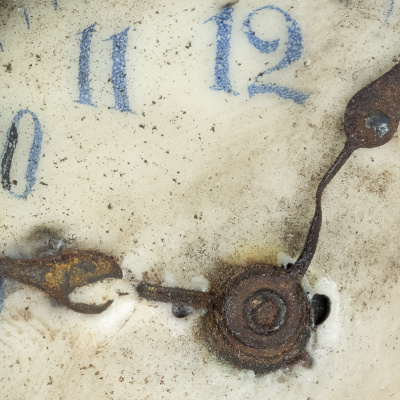 Clock found in explosion wreckage, back.