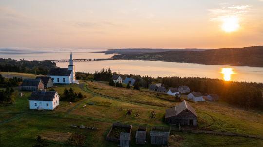 Aerial view of Highland Village at sunset.
